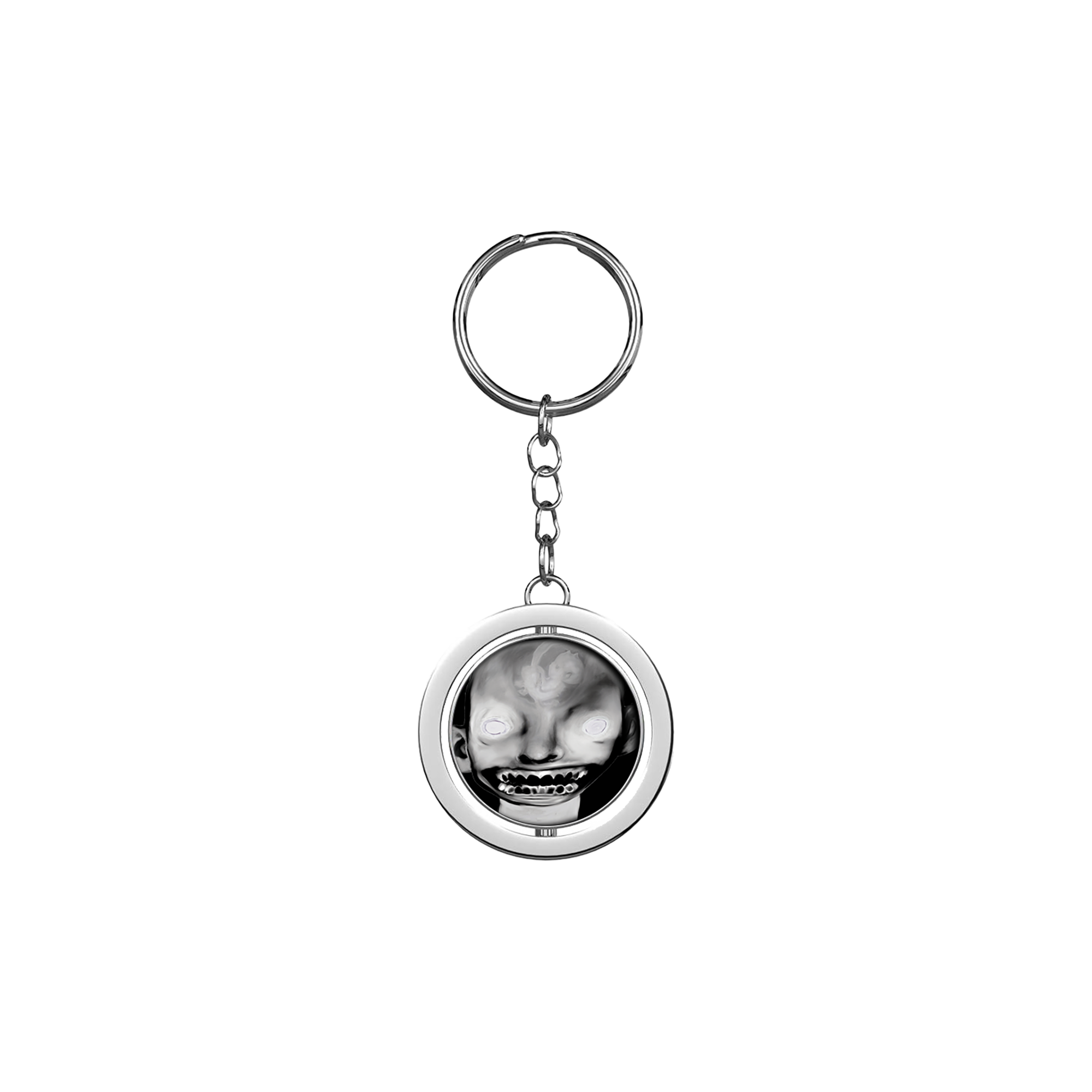 A keyring with a circular charm featuring a black and white image of a person's face